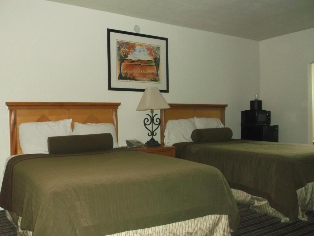 Travel Inn And Suites Fresno Quarto foto